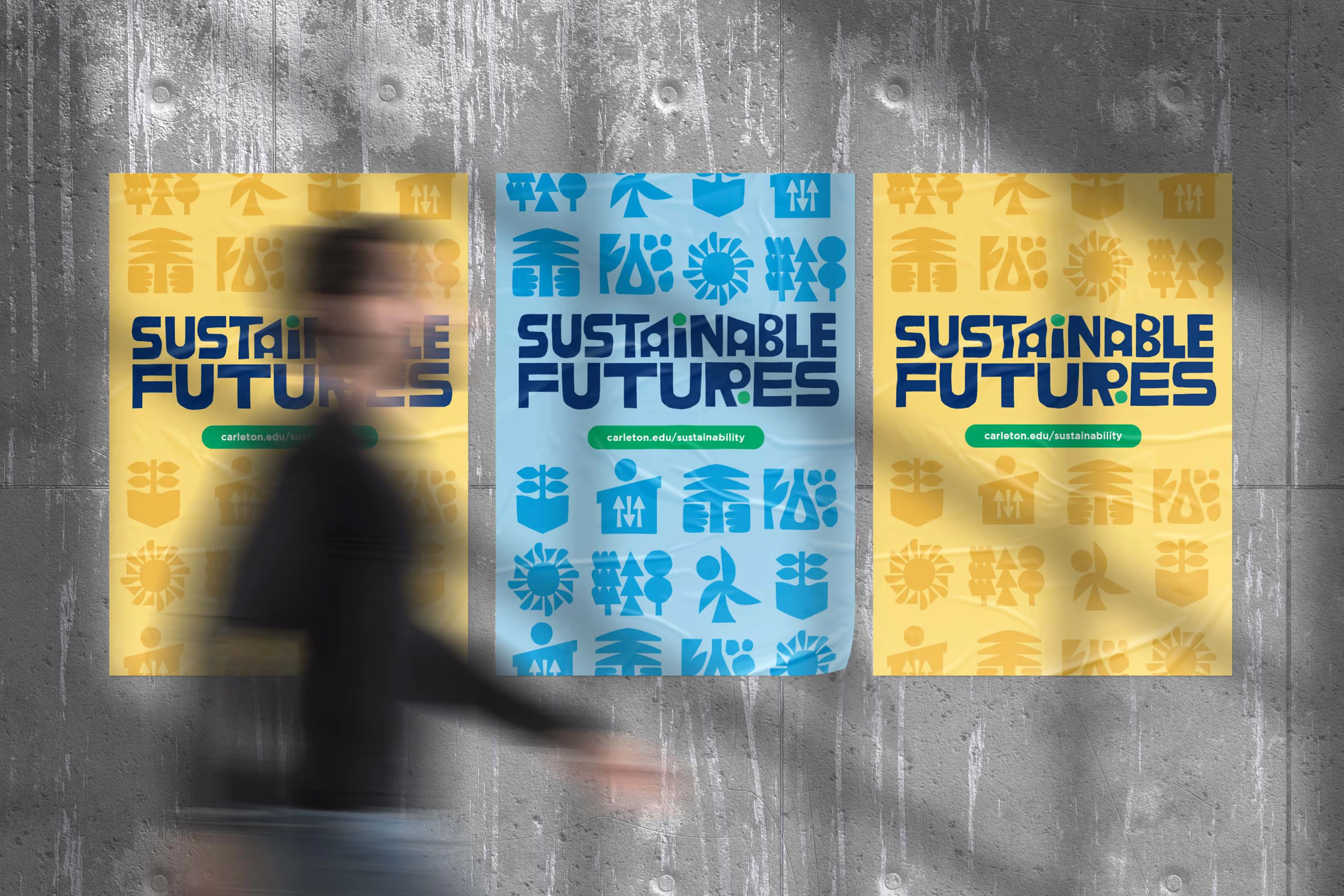 3 posters on a wall with a blurry person walking in front