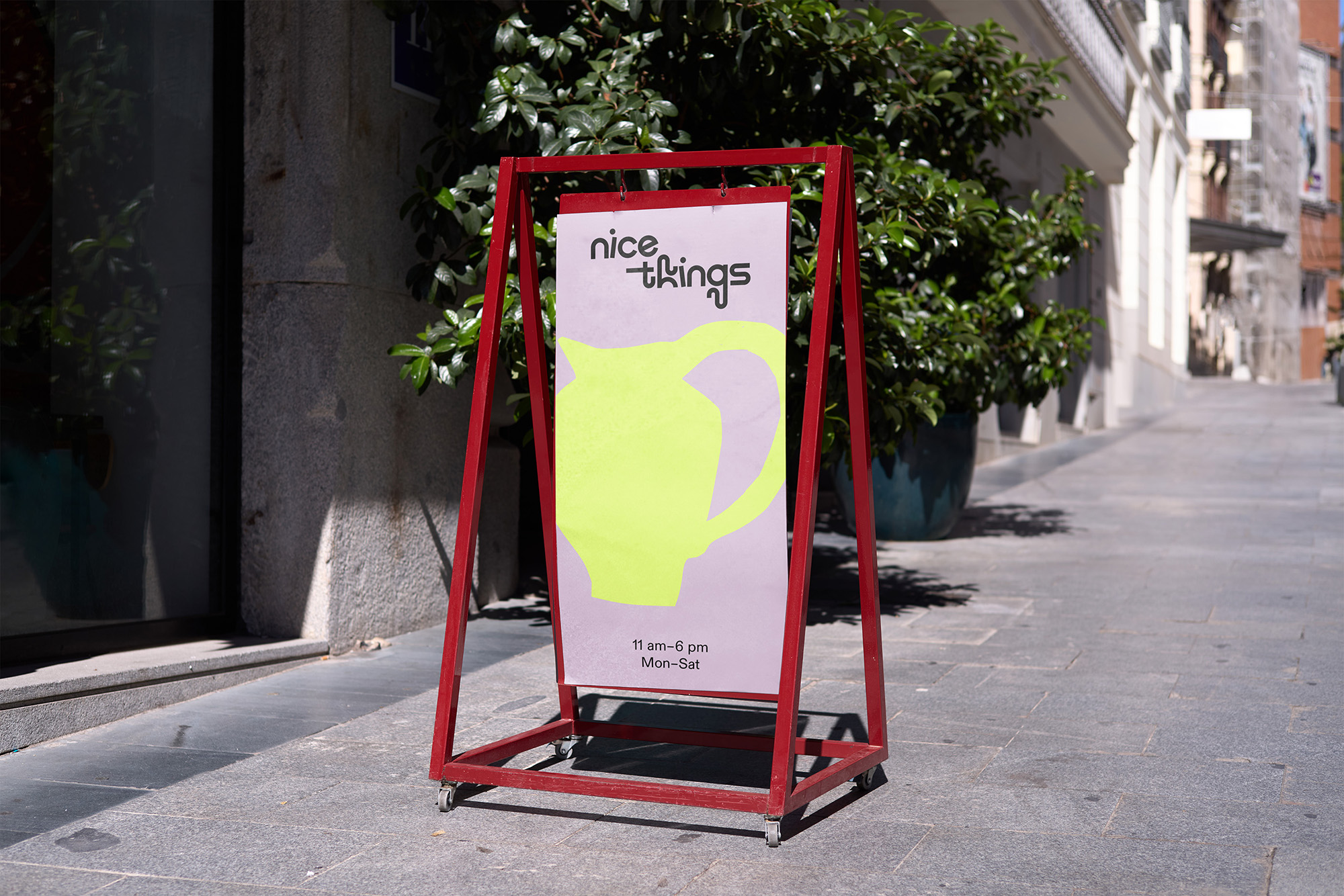 Nice Things sandwich board sign on sidewalk